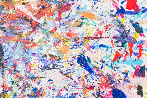 Venetian mask workshop with vibrant paint splatters