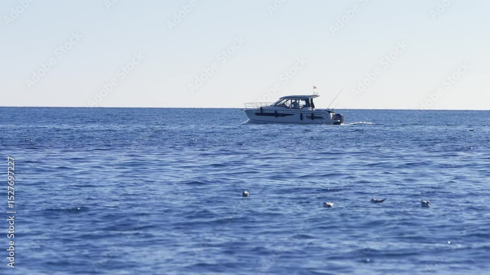 Motorboat passing by on the Mediterranean Sea Motorboat passing by on the Mediterranean Sea