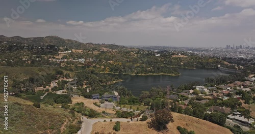 Los Angeles California Aerial v275 low flyover around Hollywood Hills capturing water reservoir, upscale residential neighborhoods and iconic sign - Shot with Mavic 3 Pro Cine - May 26th 2024
