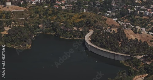 Los Angeles California Aerial v279 birds eye view flyover Hollywood reservoir, capturing residential neighborhoods and downtown cityscape on the skyline - Shot with Mavic 3 Pro Cine - May 26th 2024