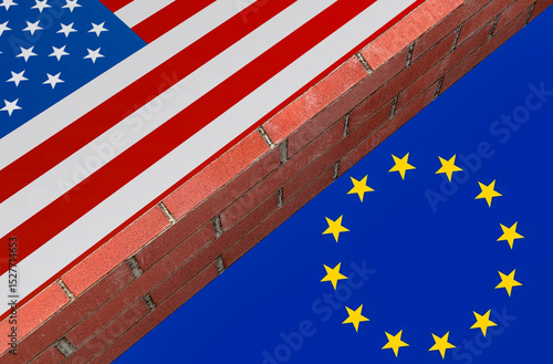 Brick wall dividing United States and European Union flags