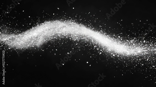 Abstract white powder swirling on black background.