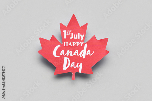 Paper maple leaf with text ...