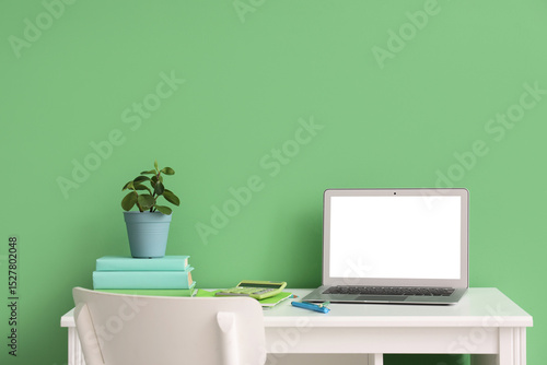 Modern laptop, stationery a...