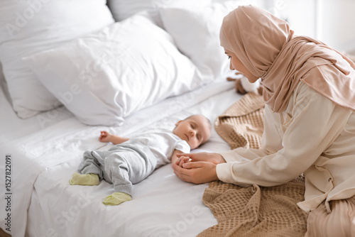 Happy Muslim mother in hija...