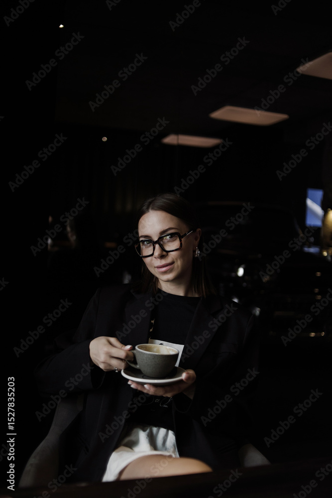 young woman drinking coffee in cafe young woman drinking coffee in cafe