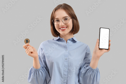 Young woman with bitcoin an...