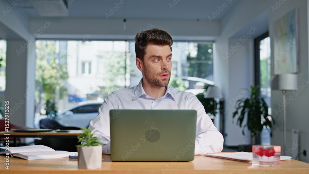 Company worker looking laptop focused on business task closeup. Serious man Company worker looking laptop focused on business task closeup. Serious man