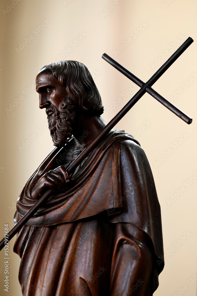 Obraz premium Collegiate Church of Saint-Jacques le Majeur. Wooden sculpture of a religious saint. Wooden sculpture of a disciple. Sallanchess. France.