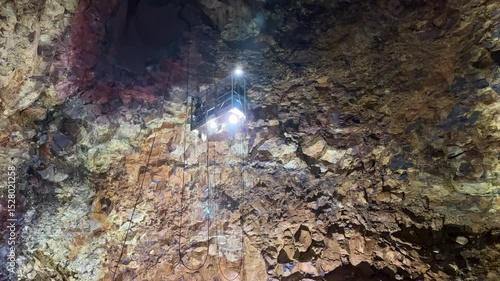 Inside Thrihnukagigur volcano with lava rock formations.