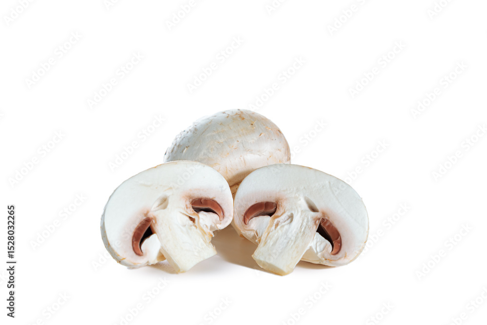 Fototapeta premium Whole and sliced champignons isolated on white background.