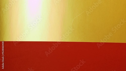 Vivid construction paper backgrounds in bold colors are gently animated by soft, natural shadows gliding across the surface, creating depth, movement, and visual warmth.