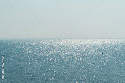 Fototapeta Naklejka Na Ścianę i Meble -  calm shiny sea on a sunny day