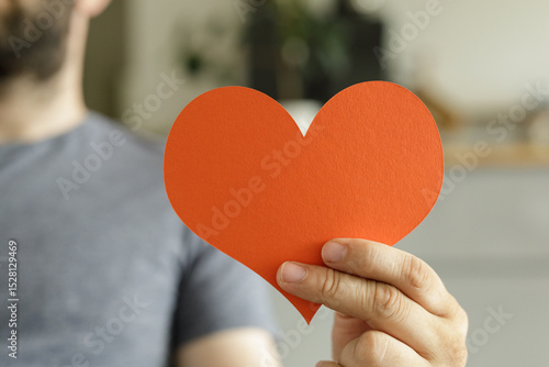 Close-up of a man's hand ho...