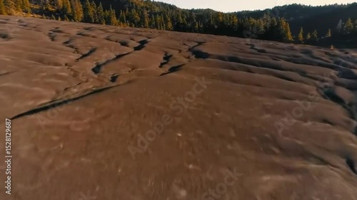 Aerial view of a dry, cracked earth landscape