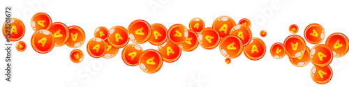 Vitamin A round capsules scattered randomly.