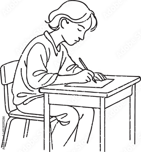 Student working at a desk writing with a pen on paper.
