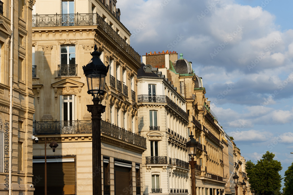 Fototapeta premium Paris, typical facades and windows, beautiful buildings, with old zinc roofs