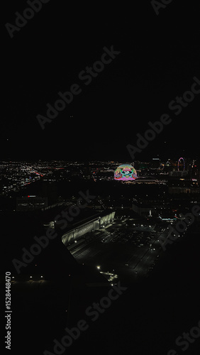 Las Vegas Strip and Convention Center at Night with Illuminated MSG Sphere and City Lights — Aerial View of Iconic Las Vegas Skyline Under Dark Sky, Vibrant Urban Travel and Night Photography