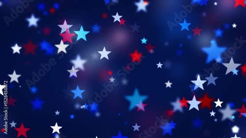 Twinkling stars in red white and blue on blue background. Festive backgrounds of star particles for USA celebrations 4th of July, Memorial Day, Veteran's Day, or any patriotic US American holidays.