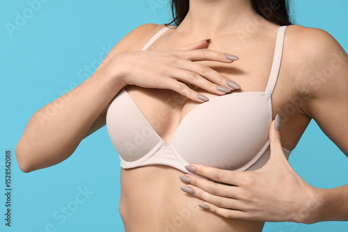 Young woman checking her br...