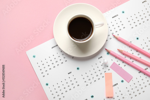 Calendar with cup of coffee...
