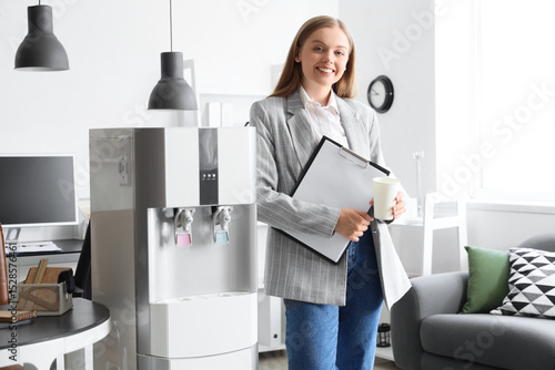 Businesswoman with clipboar...