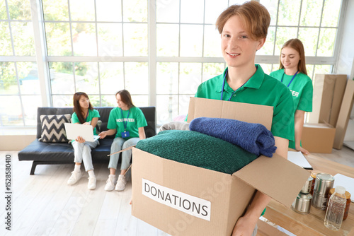 Young male volunteer with d...