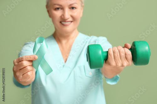 Mature female doctor with t...