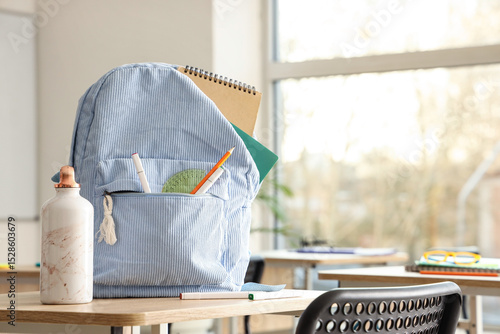 Striped backpack with schoo...