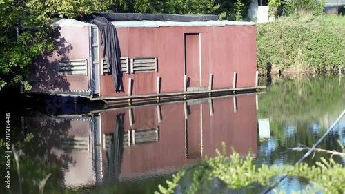 old boat house on the river