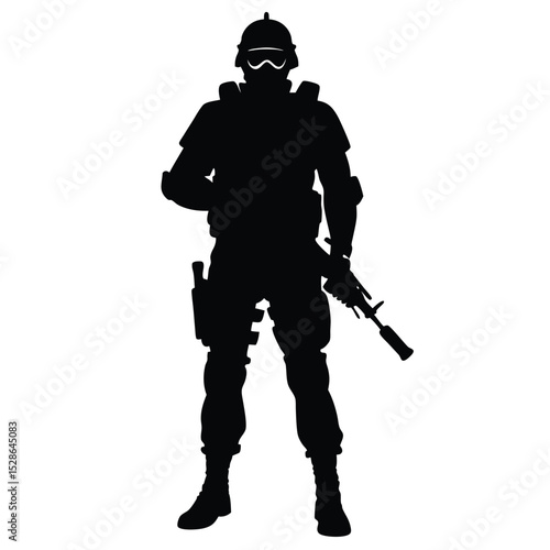 Silhouette of a heavily armed soldier standing ready for combat operations against adversaries