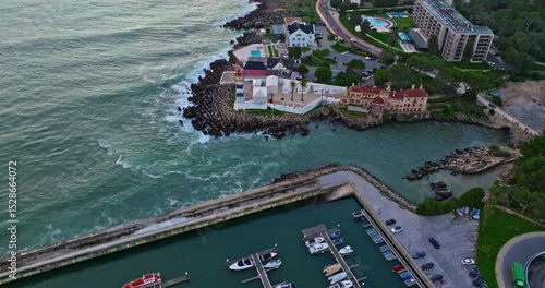 Aerial view of Aljezur Portugal. A small, cozy, traditional surf town at sunset