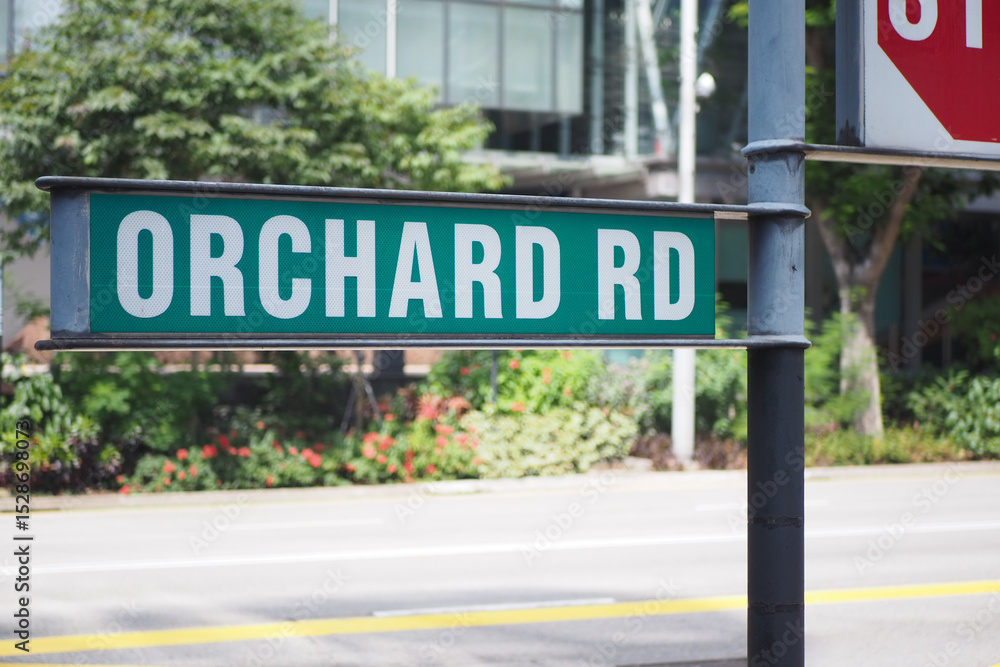 Orchard Road street sign in a vibrant urban setting Orchard Road street sign in a vibrant urban setting