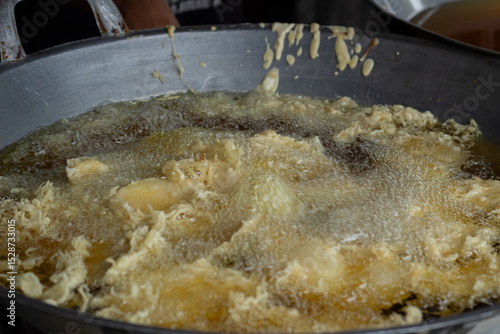 Process of frying bananas, cooked in hot oil