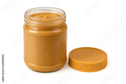 Creamy peanut butter in a glass jar with the lid off, isolated on a transparent background, ready for use