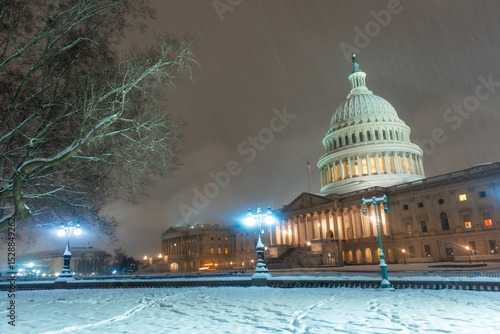 USA Capitol in winter. Congress. American Capitol Building in snow. Washington city Capitol. United States Capital. Washington, US landmark. Supreme Court. Washington D.C. monument. Washington city.