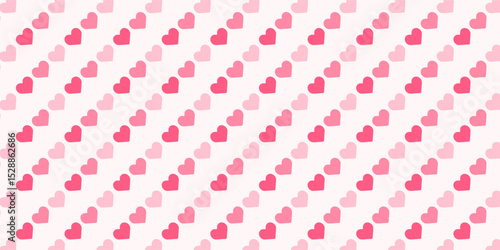 ピンク色のハートのシームレスパターン