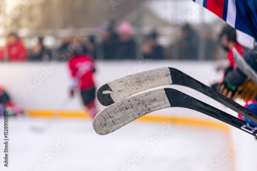 Photography Ice hockey sticks during winter classic