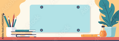 Creative Workspace with Laptop, Pencils, and Plant