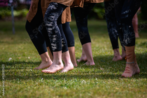 Indigenous teenagers performing a cultural dance