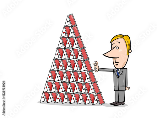 Businessman carefully dismantling a house of cards