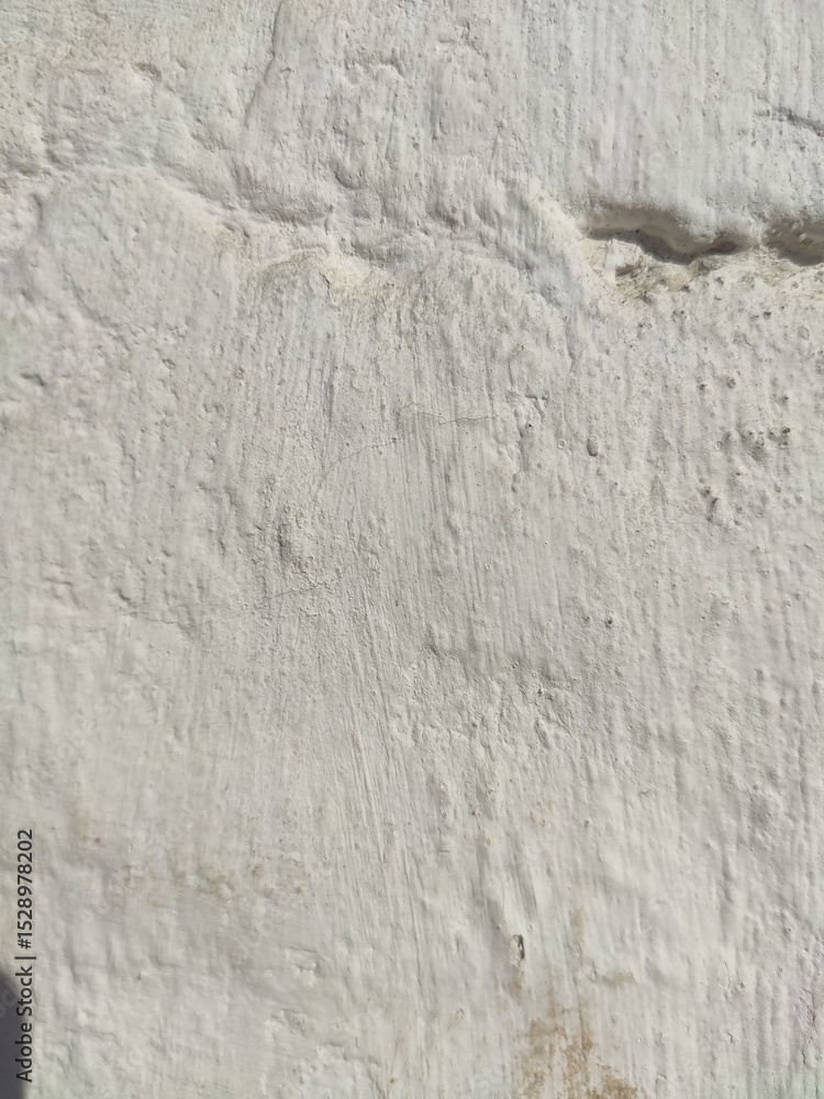 Obraz premium Whitewashed rough wall surface great for plaster textures, minimal design references, and neutral backgrounds