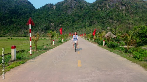 Wallpaper Mural Riding Bicycle Along The Rural Fields In Viet Hai Village In Cat Ba Island, Vietnam. Torontodigital.ca