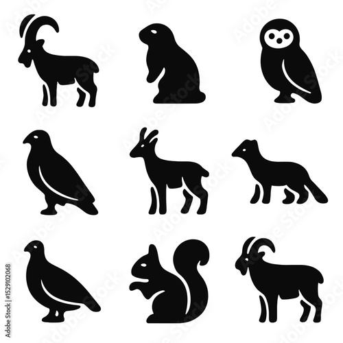 Alpine Wildlife Icons. Solid, Filled icon set of alpine wildlife: ibex, marmot, snowy owl, eagle, chamois, pine marten, ptarmigan,