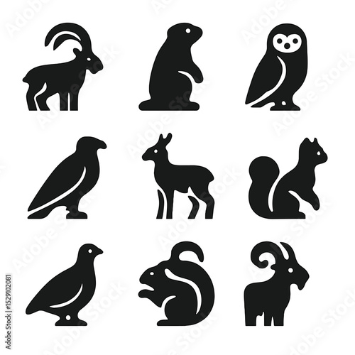 Alpine Wildlife Icons. Solid, Filled icon set of alpine wildlife: ibex, marmot, snowy owl, eagle, chamois, pine marten, ptarmigan,