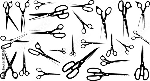 Black scissor silhouettes in different shapes, oriented in different directions, set on white
