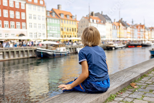 Canvas Print Family with children and pet dog, kids and adults visiting Coppenhagen , capital