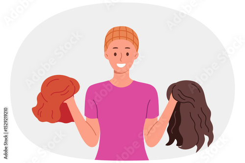 Woman chooses wig, wanting to change image and have long hair, after chemotherapy which caused baldness. Two wigs in hands of girl using artificial hair to disguise and fake appearance