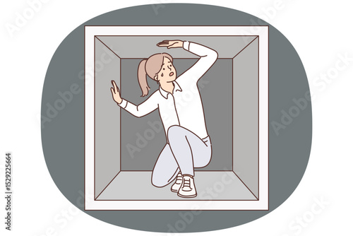 Discouraged woman is trapped sitting in small box experiencing claustrophobia and repressed emotions